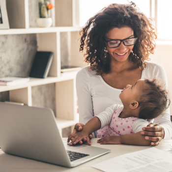 working mom attending to her baby