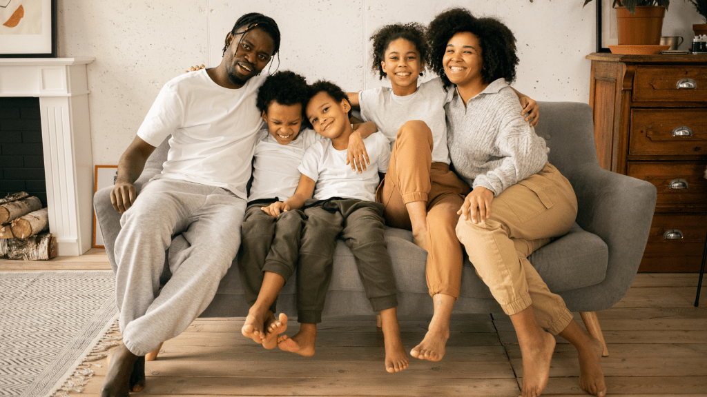 mom with her family - Exploring the World Through Travel and Representation with Natalie Preddie